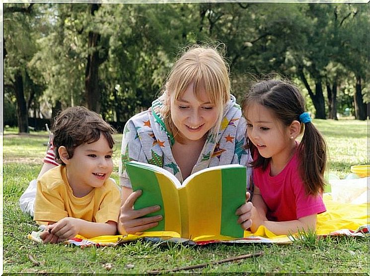 Mother reads to children