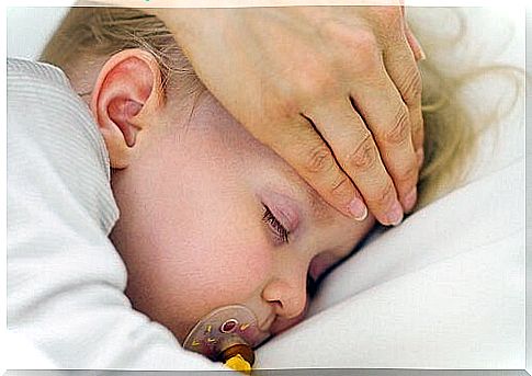 Child with a fever sleeping