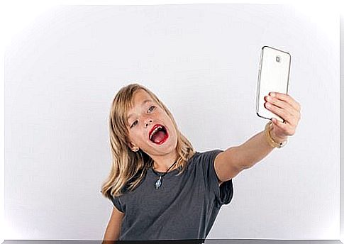 Child takes selfie