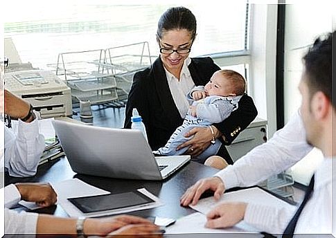 Mother with baby at work