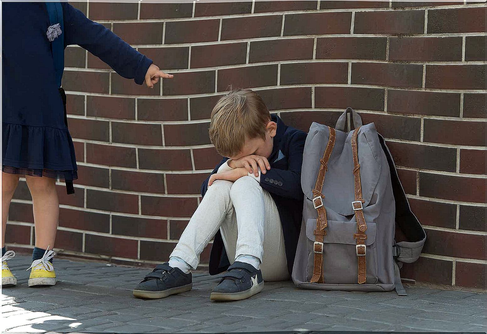 An elementary school boy who is being bullied.