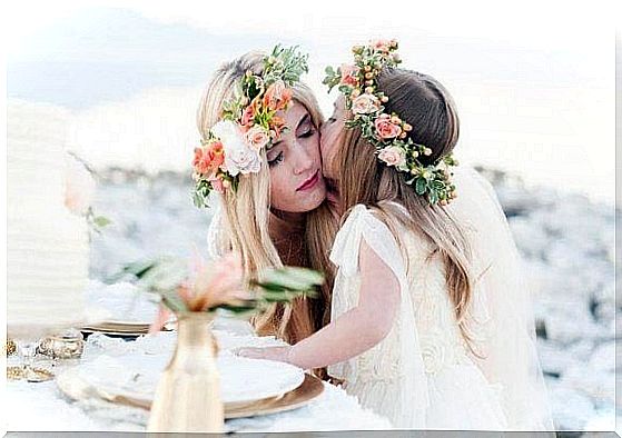 Mother and daughter with flower wreath