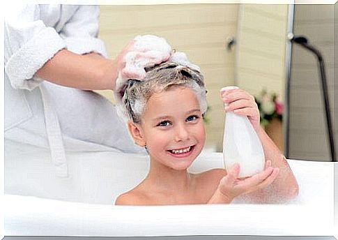 Child with shampoo in her hair