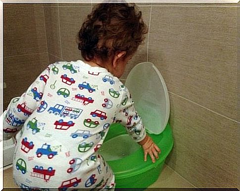 Child with a green potty