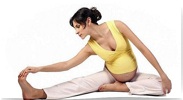 Pregnant mom doing yoga