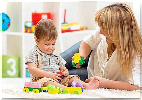 Mommy and child playing with blocks