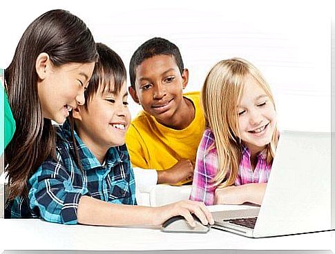 Children learn on a laptop