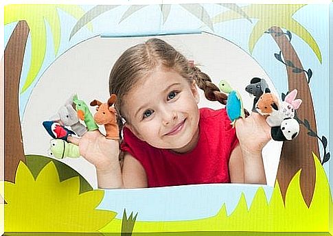 Girl with finger puppets